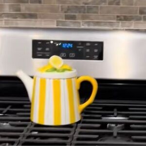 Yellow and White Striped Ceramic Teapot with Lemon Top Accent